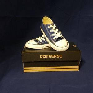Blue and white converse shoes